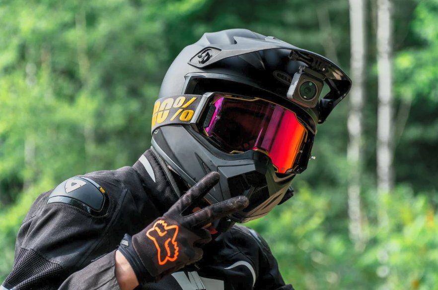 Motocross rider with reflective visor